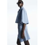 PLEATED A-LINE DENIM SHORTS